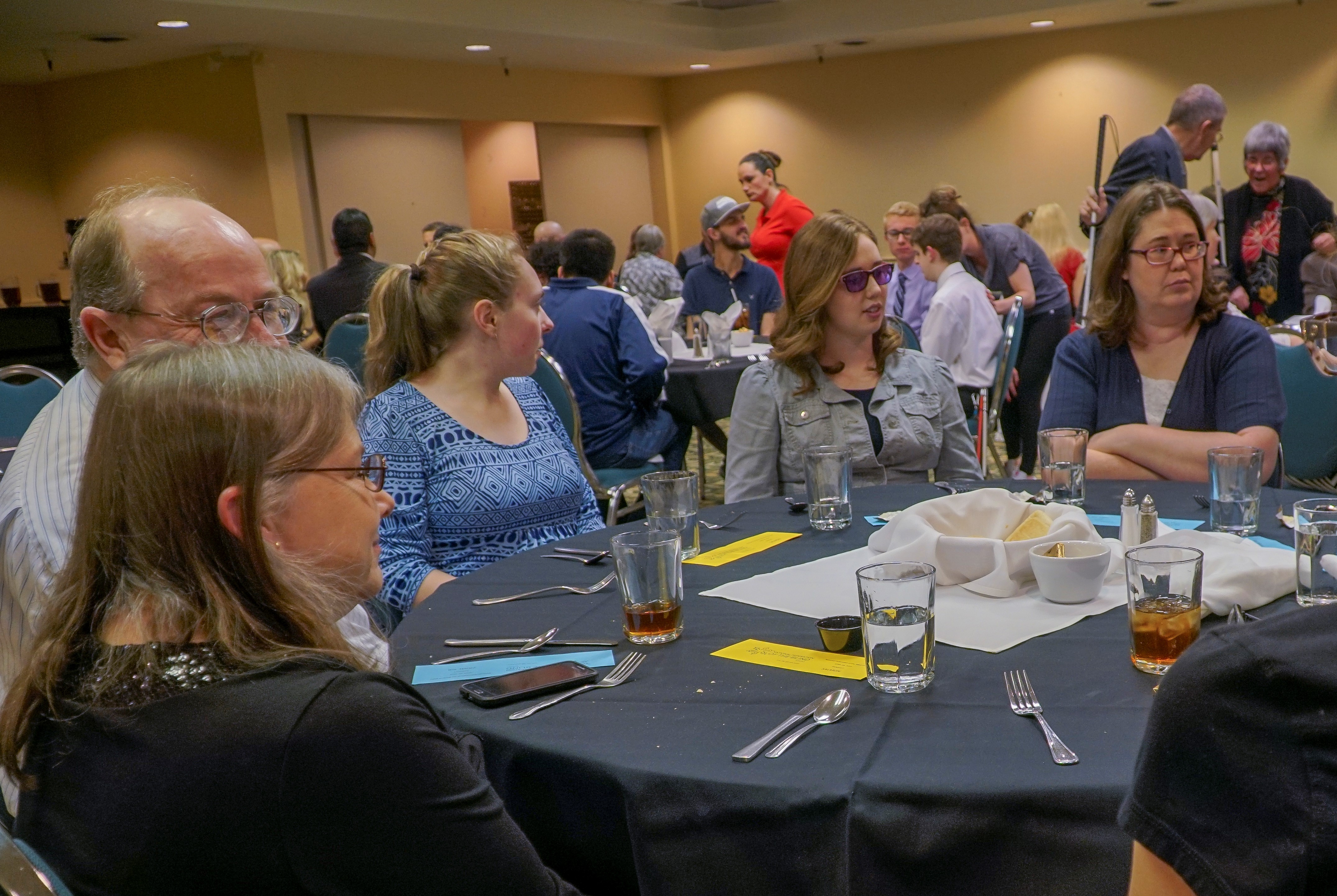 Photo of people at one of the banquet tables