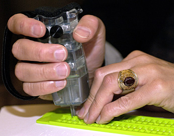 writing braille with slate and stylis