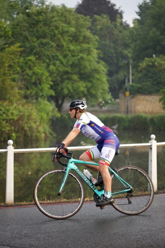 Cyclist in sporting gear riding for a charity event